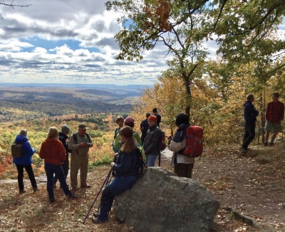 Hike through a waterfall at Spruce Mountain